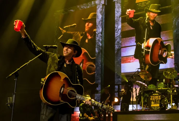 toby keith performing with gitar